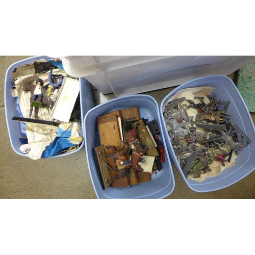 719 - A collection of lead and plastic military figures