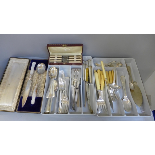 757 - A collection of plated flatware including cased servers with mother of pearl handles