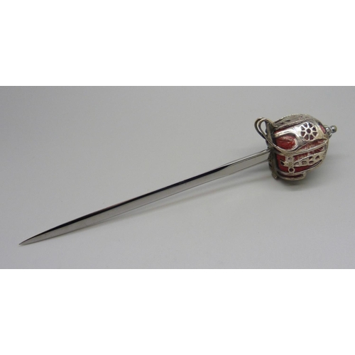 822 - A hallmarked silver handled letter opener in the form of a sword, the blade marked Wilkinson, 17.5cm