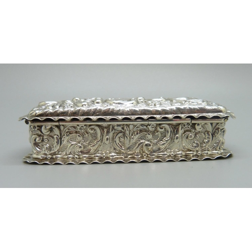 829 - An embossed silver box, Birmingham 1903, Jones & Crompton, 53g, 9cm wide