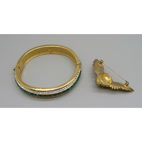 875 - A Butler & Wilson brooch and an Atwood and Sawyer bangle