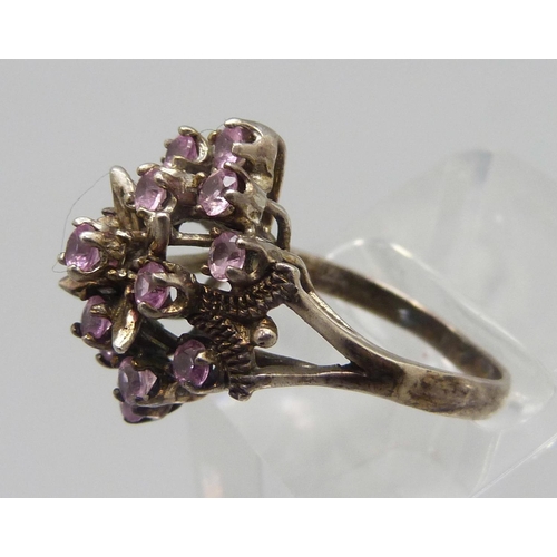 887 - A large silver and pink stone cluster ring, T