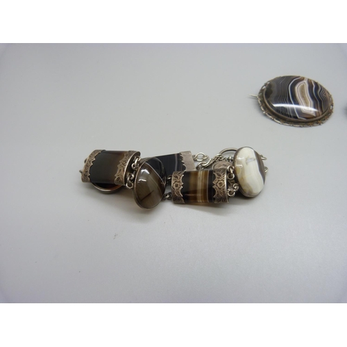 897 - An agate set bracelet and two brooches, (one brooch cracked)