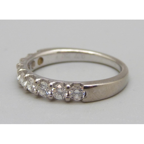 906 - An 18ct white gold nine stone diamond ring, 4.1g, O, 0.77 carat weight marked in the shaft, colour F... 