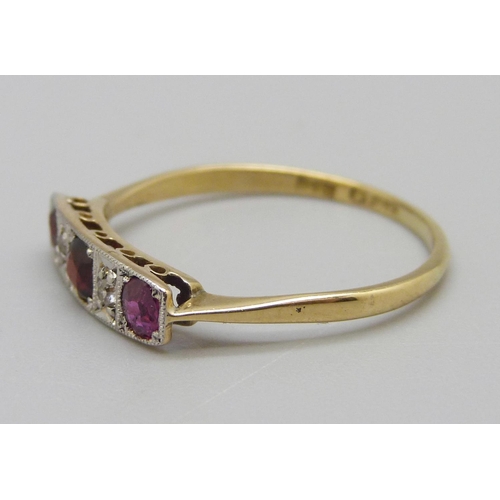 912 - An Art Deco 18ct gold, garnet and diamond ring, 2g, T, one stone replaced