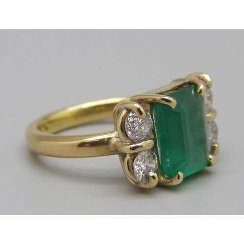 926 - An 18ct gold, emerald and diamond ring, emerald approximately 3ct weight, 6.6g, N