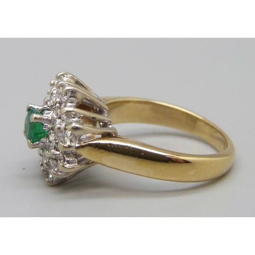 935 - A 14ct gold, diamond and green stone ring, 5.6g, K