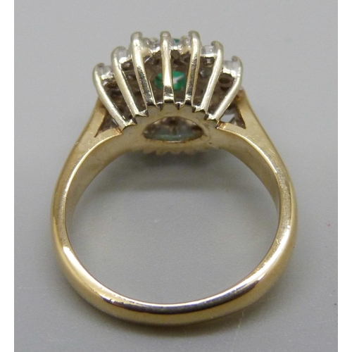 935 - A 14ct gold, diamond and green stone ring, 5.6g, K