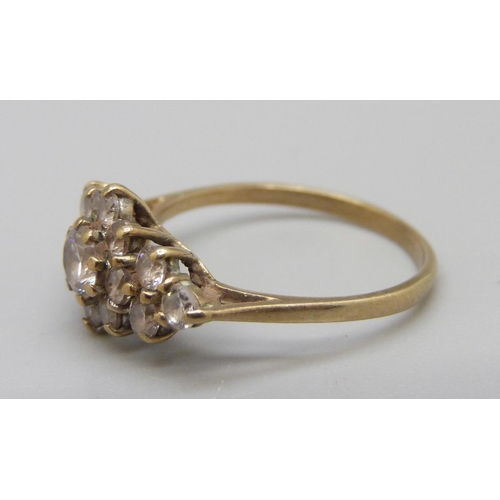 943 - A 9ct gold and white stone ring, 2g, N