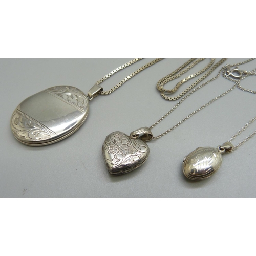 947 - Three silver lockets and chains