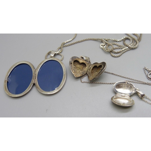 947 - Three silver lockets and chains