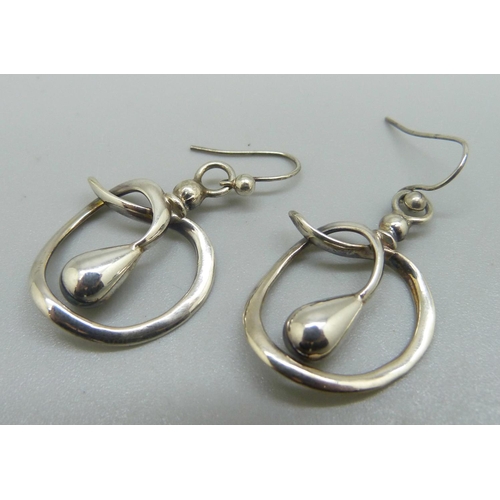 952 - A pair of earrings made from two silver hat-pin tops by Charles Horner