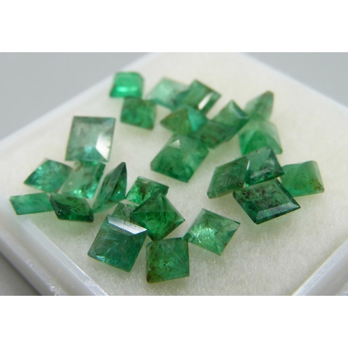 954 - A collection of unmounted emerald stones