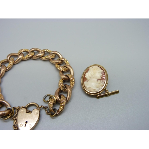 957 - A 9ct gold mounted cameo brooch, a plated bracelet and a fob/pendant