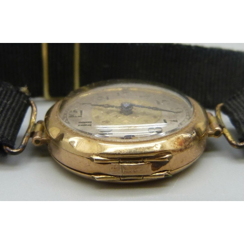 962 - A lady's 9ct gold wristwatch, cased