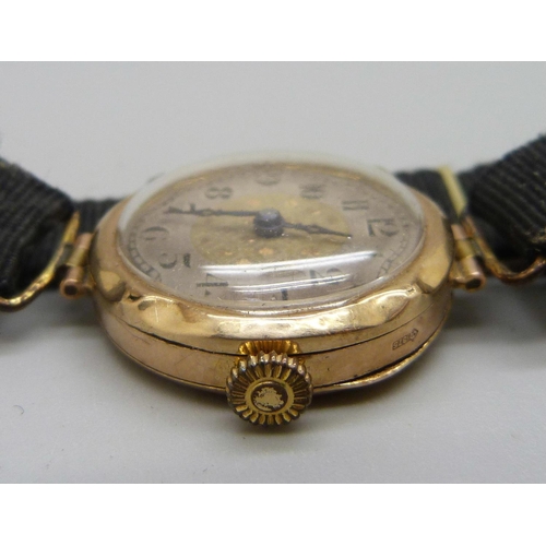 962 - A lady's 9ct gold wristwatch, cased