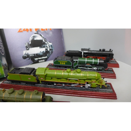 998 - Six models of steam locomotives on wooden plinths and a Flying Scotsman DVD and book set