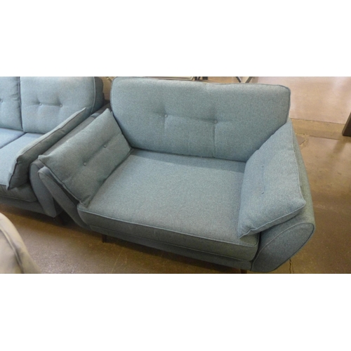 1548 - A DFS French Connection three seater, two seater and love seat in blue textured weave fabric with da... 