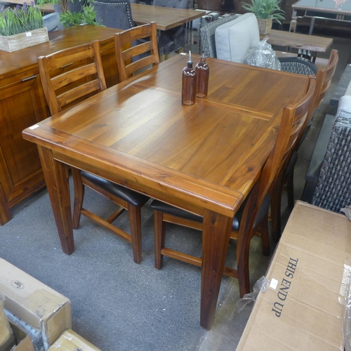 1560 - An Acacia dining table and four chairs