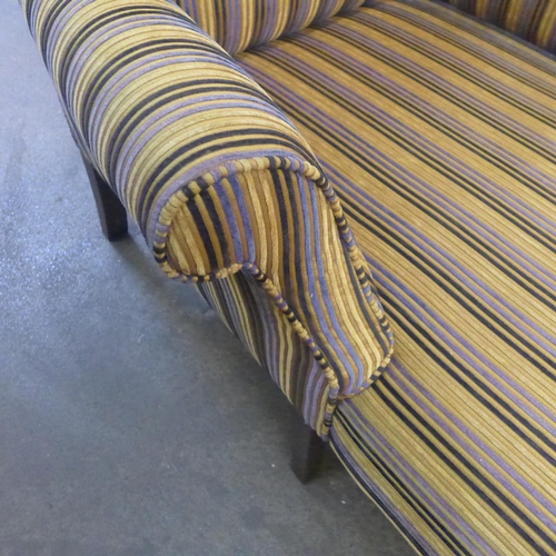 1598 - A gold blue and black striped chaise with dark wood legs