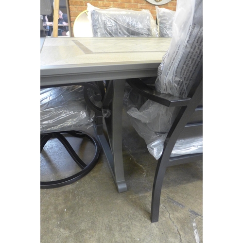 1594 - A 7 piece Cushioned outdoor Dining Set and two additional chairs (4123-18)   * This lot is subject t... 