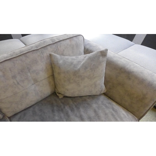 1625 - A grey velvet shark skin effect pinched back three seater sofa on chrome legs