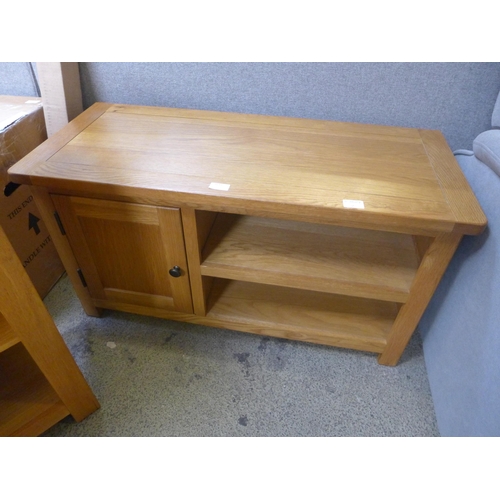 1643 - An oak single door TV/media unit and a small oak bookcase