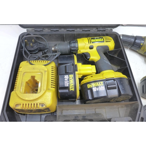 2020 - Two Dewalt 18V cordless drills with 3 batteries, charger and case