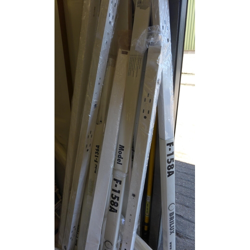 2417 - Approx 12 Brilux fluorescent strip light fittings (no bulbs) plus approx 20 8ft lengths of wall cond... 