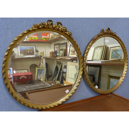 598 - A pair of Regency style gilt framed circular mirrors