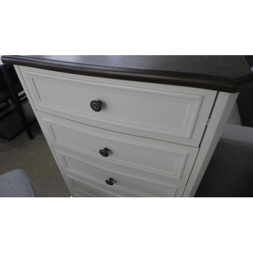 1994 - A five drawer tallboy with contrasting top