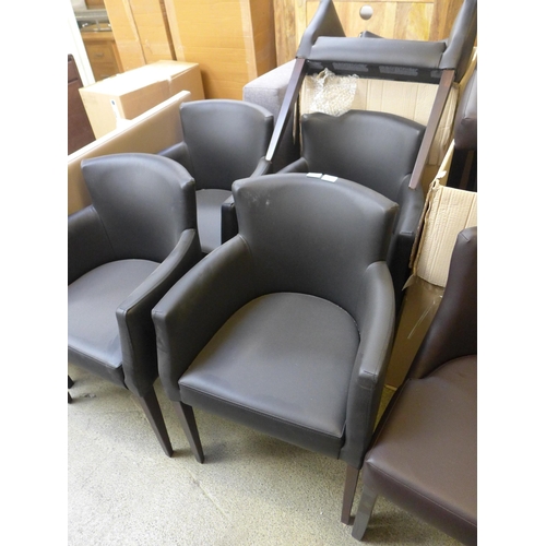 1996 - A set of six black upholstered armchairs