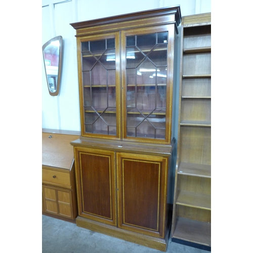 107 - An Edward VII inlaid mahogany bookcase