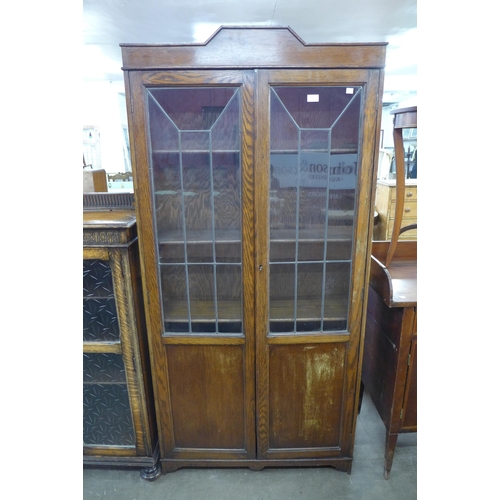 112 - An Art Deco oak two door bookcase