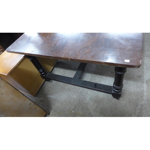 233 - A Victorian painted beech kitchen table with an elm top