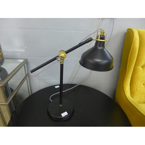 1346 - A black and gold anglepoise lamp