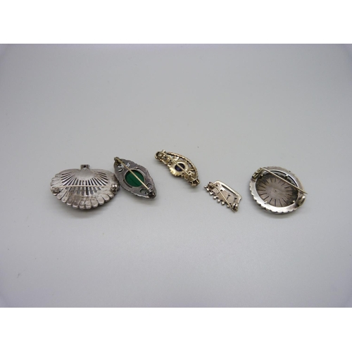 1013 - Three silver brooches and two other brooches