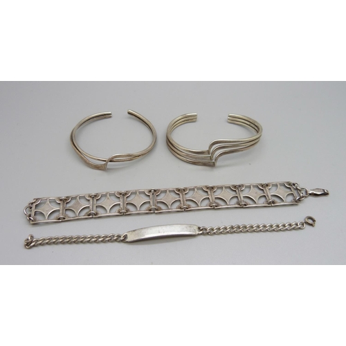 1015 - Two silver bangles and two bracelets