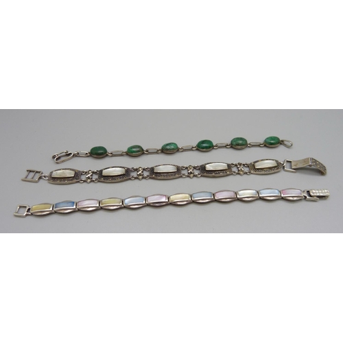 1024 - Three silver gem set and mother of pearl set bracelets