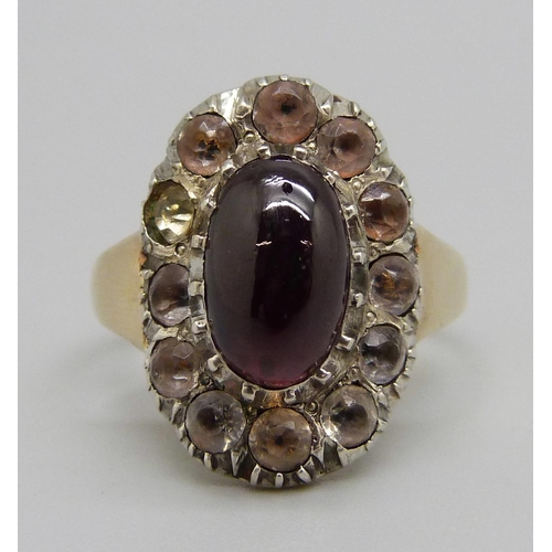 1043 - A late Georgian/early Victorian paste and cabochon garnet cluster ring, gold shank, silver settings,... 