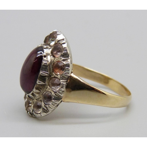 1043 - A late Georgian/early Victorian paste and cabochon garnet cluster ring, gold shank, silver settings,... 