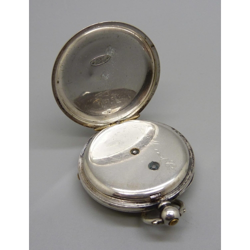 1063 - A silver cased fob watch