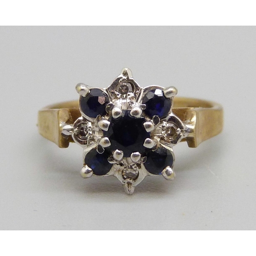 1066 - A 9ct gold, diamond and sapphire ring, 2.6g, G/H