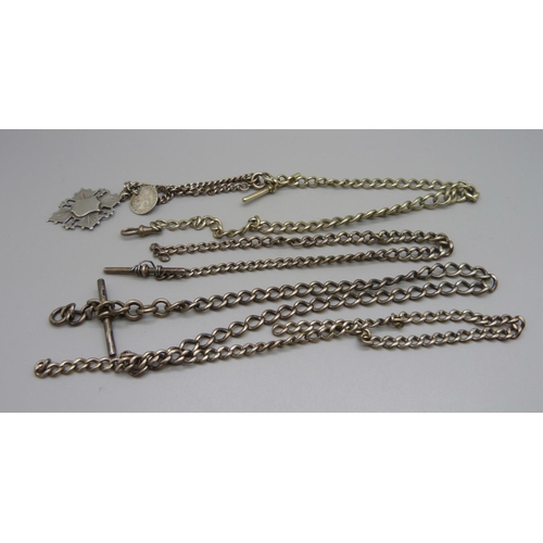 1068 - Three silver chains, two with T-bars, 67g, and a plated Albert chain with silver fob medal