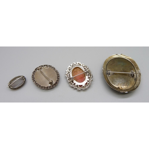 1073 - Four brooches; one large silver mounted brooch marked after Thomas Lawrence, cameo, micro-mosaic and... 