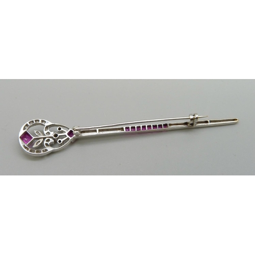 1077 - A diamond and ruby set brooch