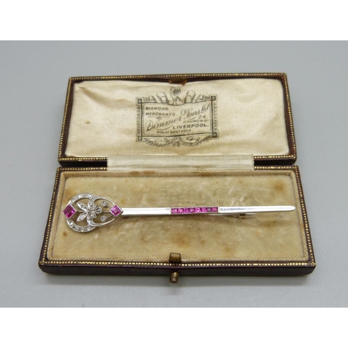 1077 - A diamond and ruby set brooch