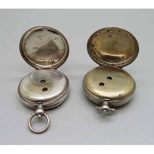 1087 - Two 800 silver fob watches, one glass cracked