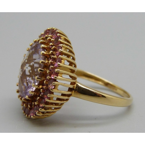 1090 - An 18ct gold, amethyst and pink tourmaline dress ring, 5g, N