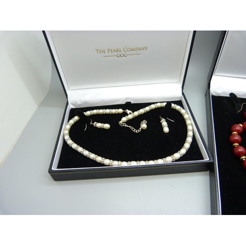 1095 - Two 'The Pearl Company' pearl necklace with matching earring sets, boxed